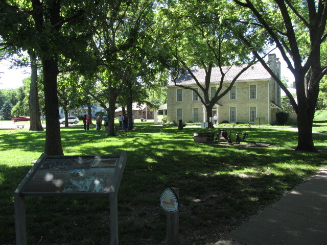 A wayside and marker outside Seth Hays Home at Council Grove, KS