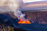 Fountains of lava erupt from a crater floor hundreds of feet into the air. 