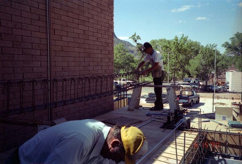 Workers during the construction of headquarters addition.