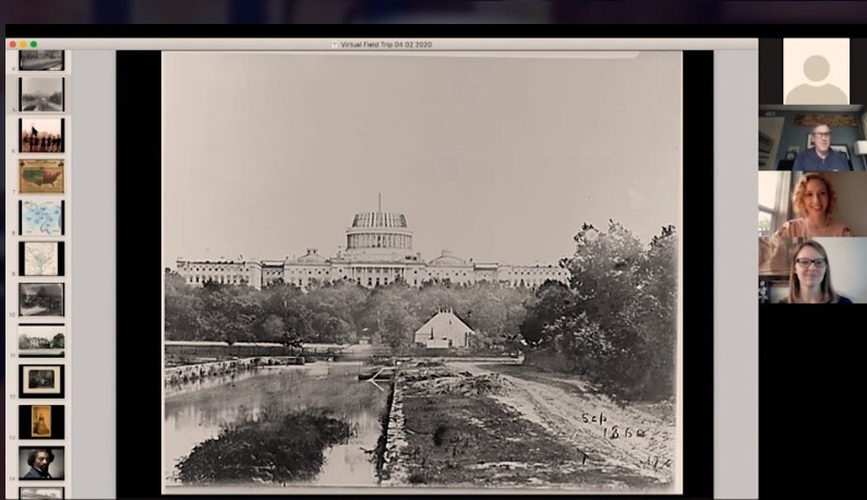 A screenshot of a virtual meeting, where staff members are pictured next to an antique photo of the US Capitol Building. 