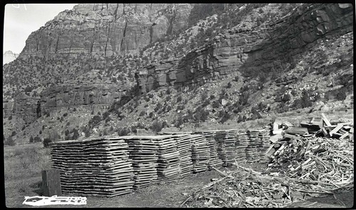 Stacked bundles of shakes made by Civilian Conservation Corps (CCC) workers for use on the roof of the administration building, Oak Creek.