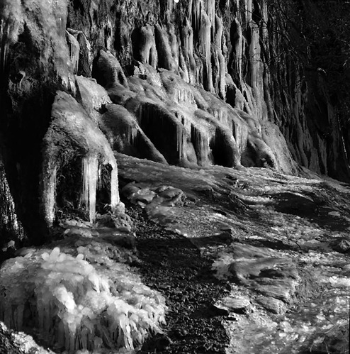 Weeping Rock covered in ice in winter.