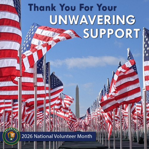 Rows of American flags and a tall monument in the distance and the words "Thank You For Your Unwavering Support / 2026 National Volunteer Month."
