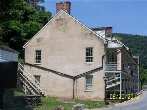 2012 - Views of the deteriorating stucco on the west elevation of the historic John Wilson Building #45 in Lower Town, Harpers Ferry, WV.