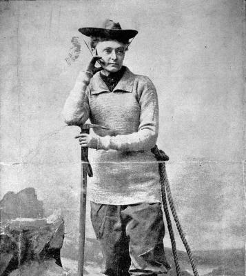 Standing portrait of Annie Smith Peck in climbing gear.