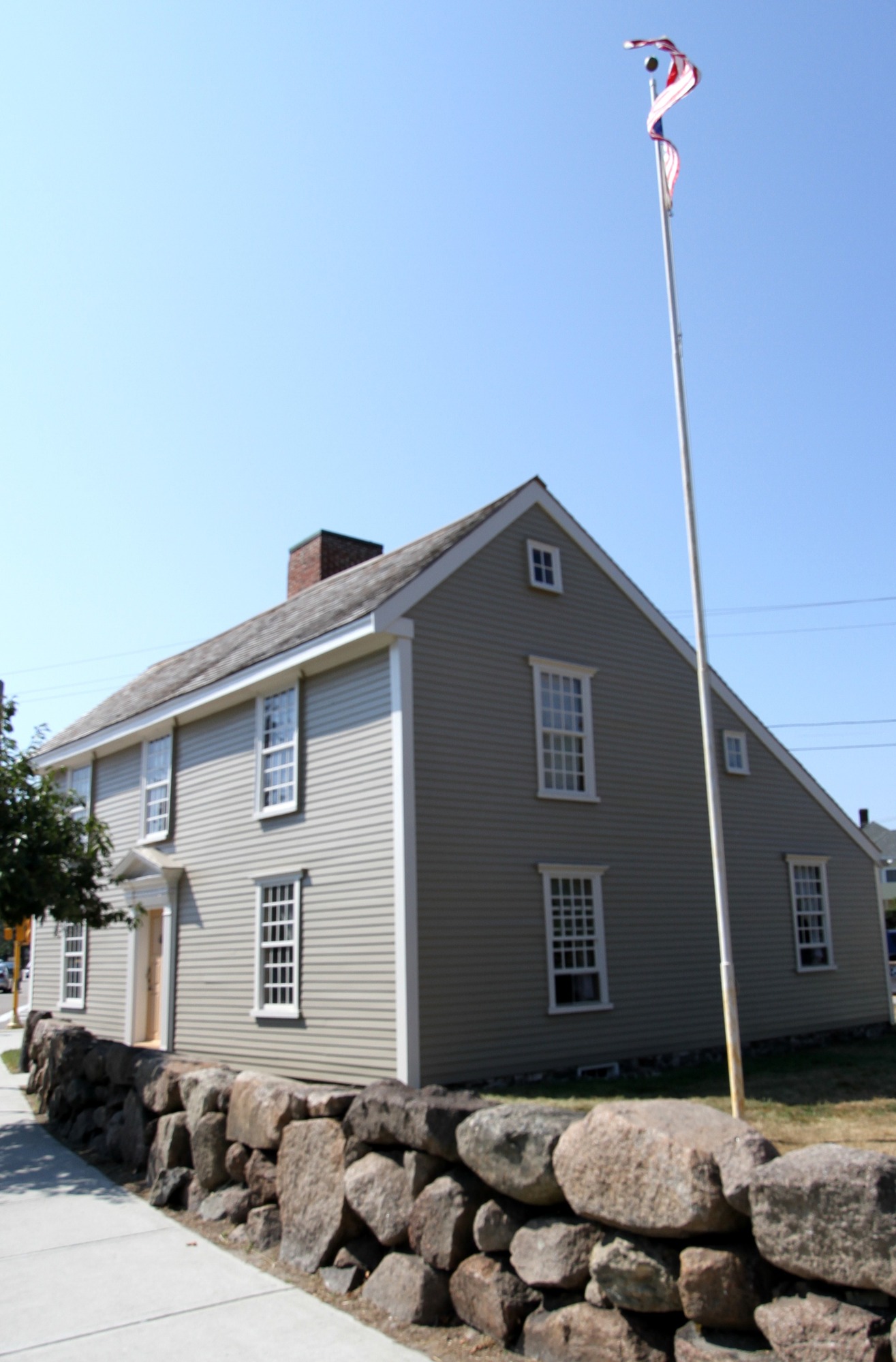 Grey clapboard cottage where John Quincy Adams was born 