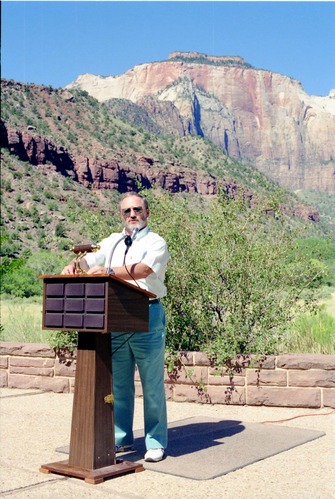 Color Photos of the parks 72nd anniversary celebrations- cake cutting, barbecue, speakers.