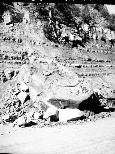 Rock fall - 50-ton boulder slid onto roadway second switchback up from Pine Creek.