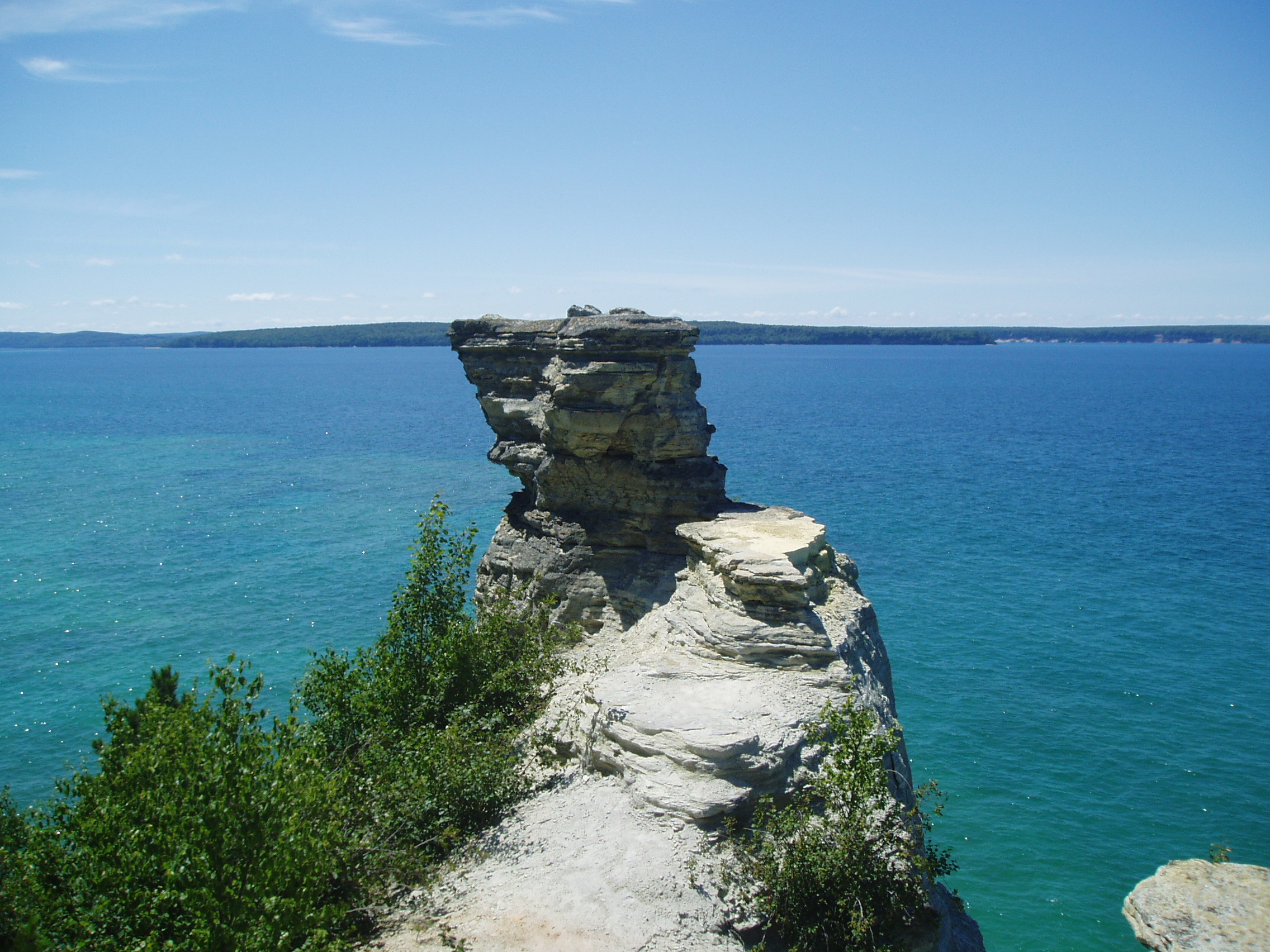 The turret looking portion at the top of Miners Castle. Miners Castle is a sandstone layered, heavily eroded narrow rock formation sticking out into Lake Superior.