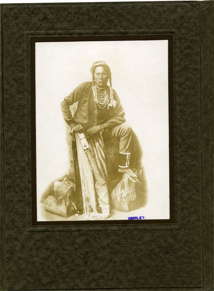 Curly in Full View with 10 Necklaces