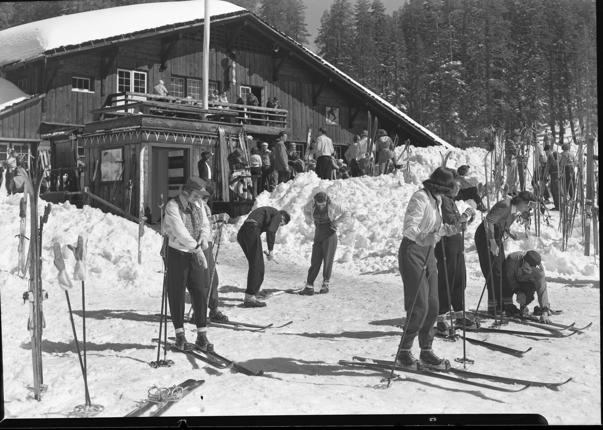 Crowd of skiers in front of Badger Pass ski house on holiday