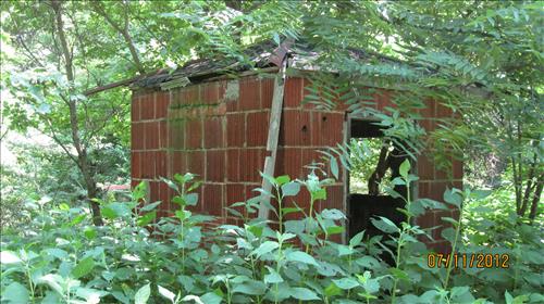 Demolition of Company (Quarry Workers) Houses on School House Ridge South Harpers Ferry Natiponal Historical Park in June 2013