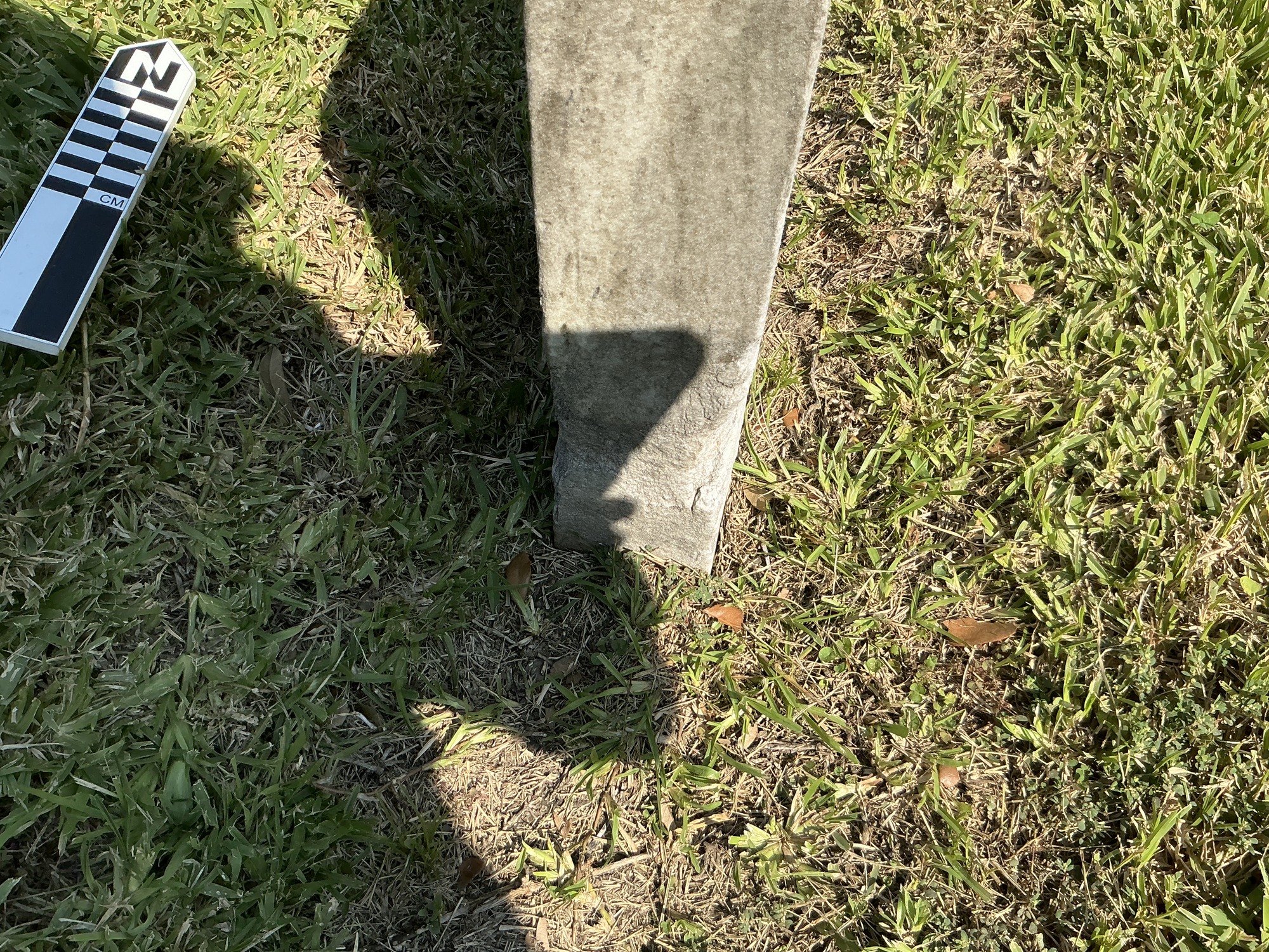Extra image of historic upright marble headstone with recessed shield face.