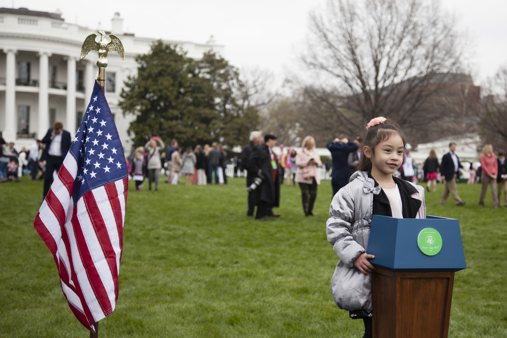 A young girl poses as the future President of the United States. 