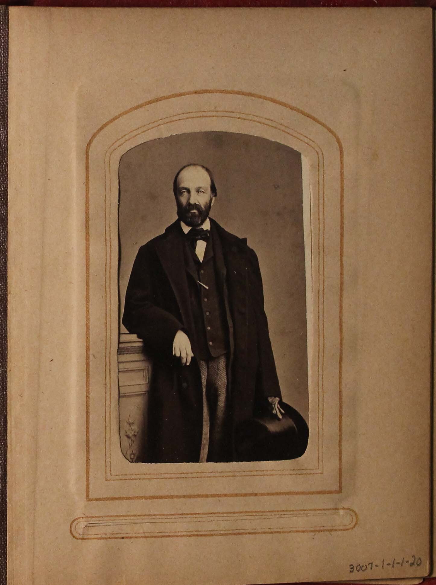 Black and white photograph of balding man.