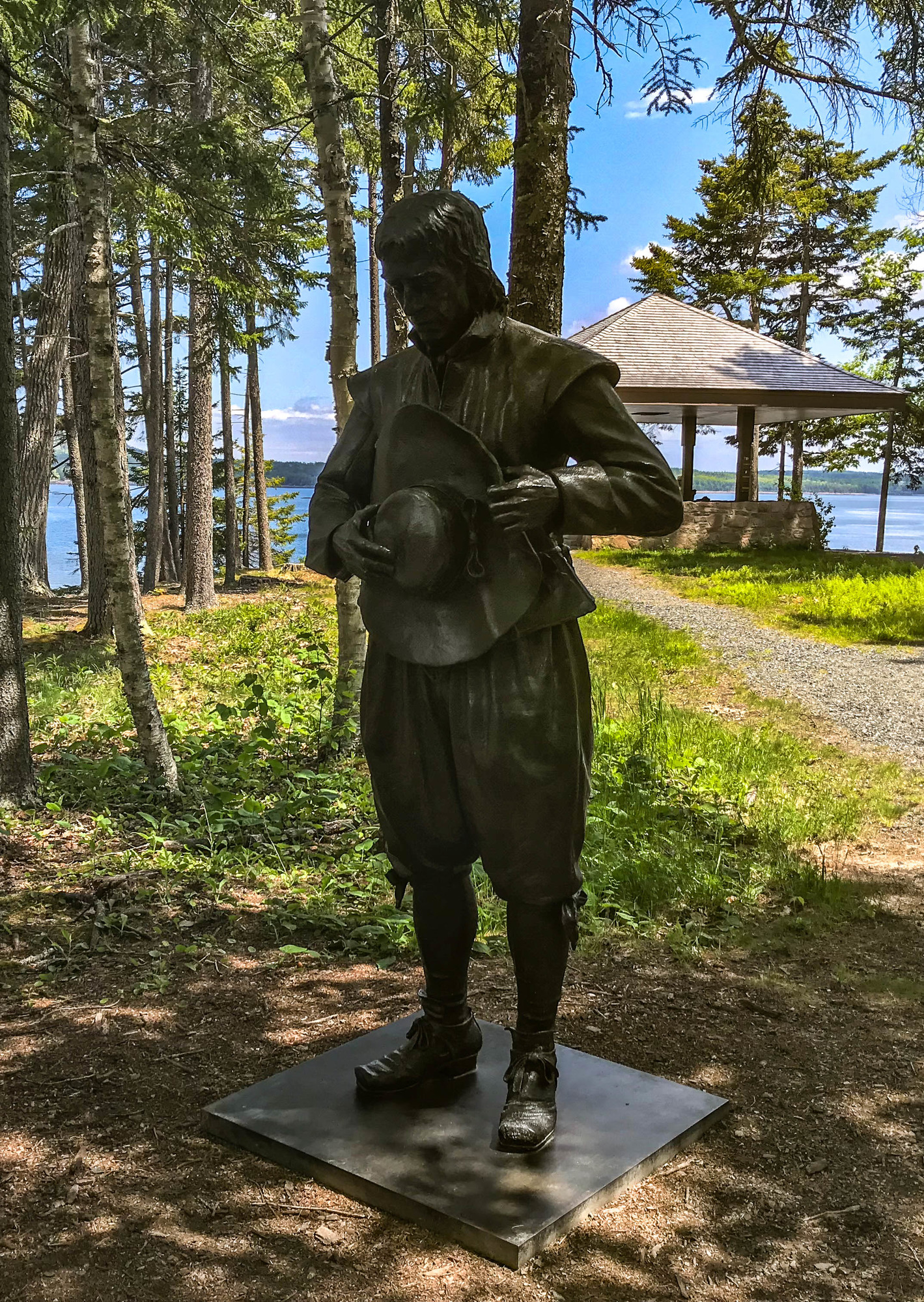 Statue of a French explorer holding a hat