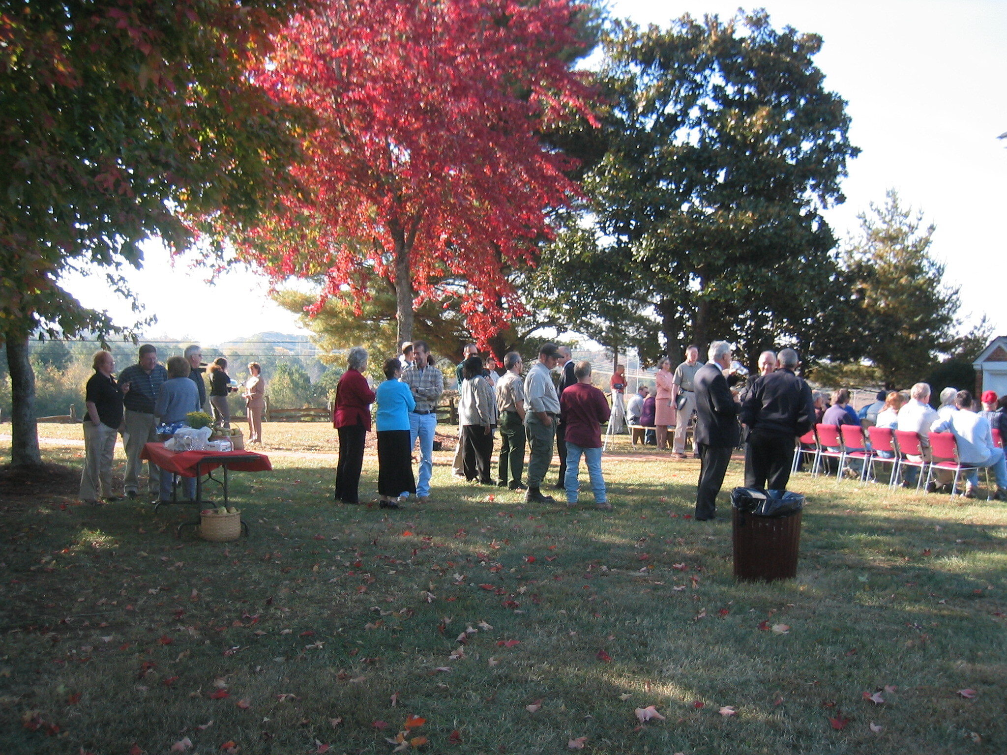 Red leaves bring fall colors to a land acquisition dedication at the Chief Vann House Historic Site