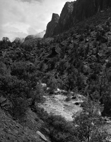 Flooding of Pine Creek after very heavy showers as it flows below Bridge Mountain before joining the Virgin River.