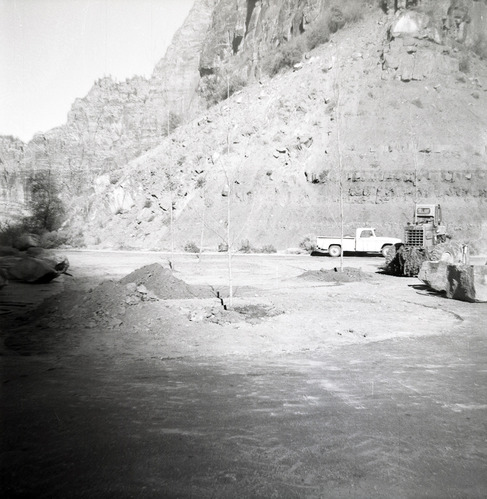 Construction vehicles clearing road during road grading to Chamberlain Ranch and the Narrows.