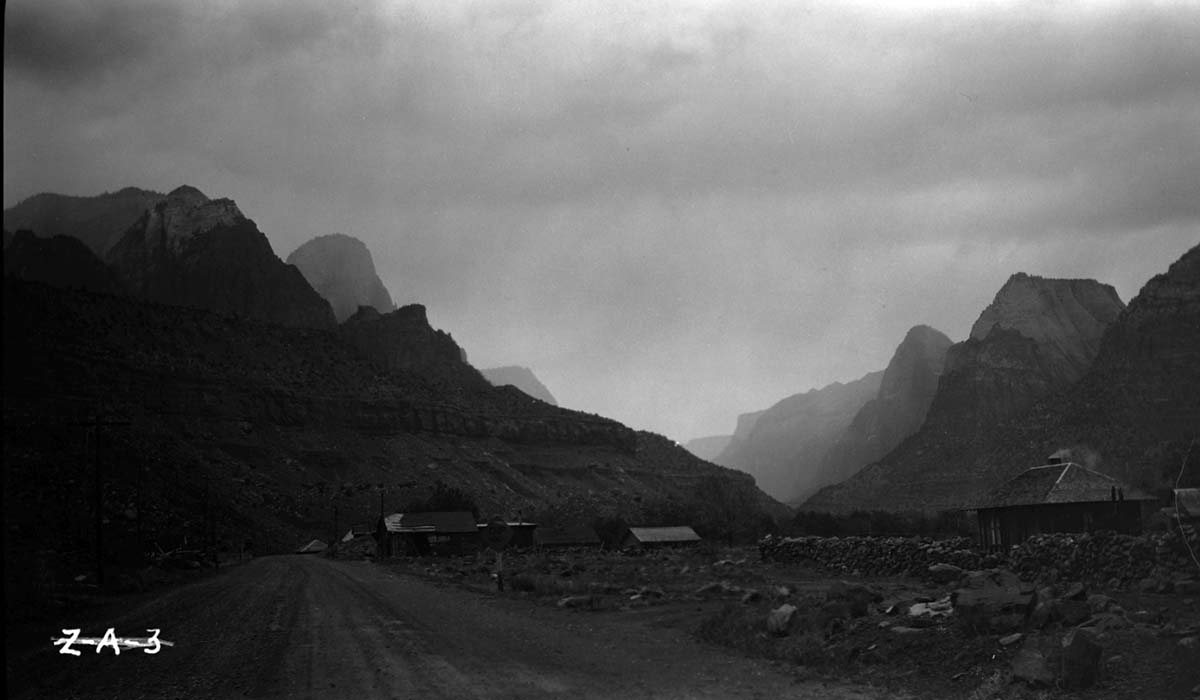Pioneer dwelling near Springdale, cabins with rock wall.