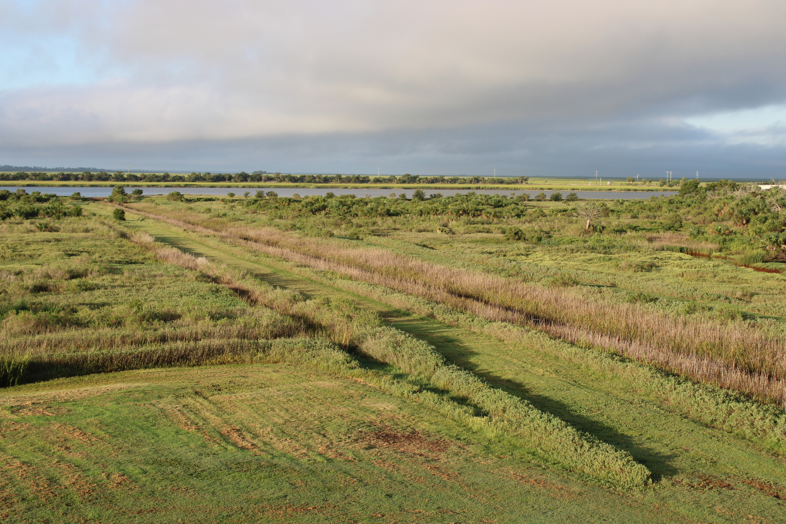 A canal crosses the landscape towards a river. 