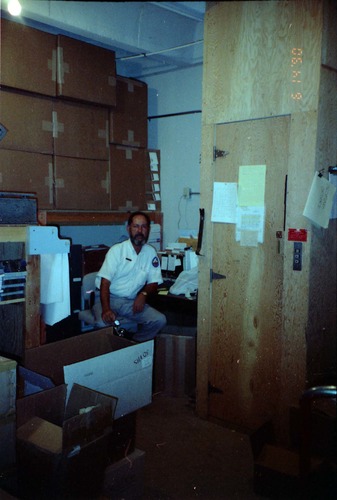 Man working on construction of headquarters addition.
