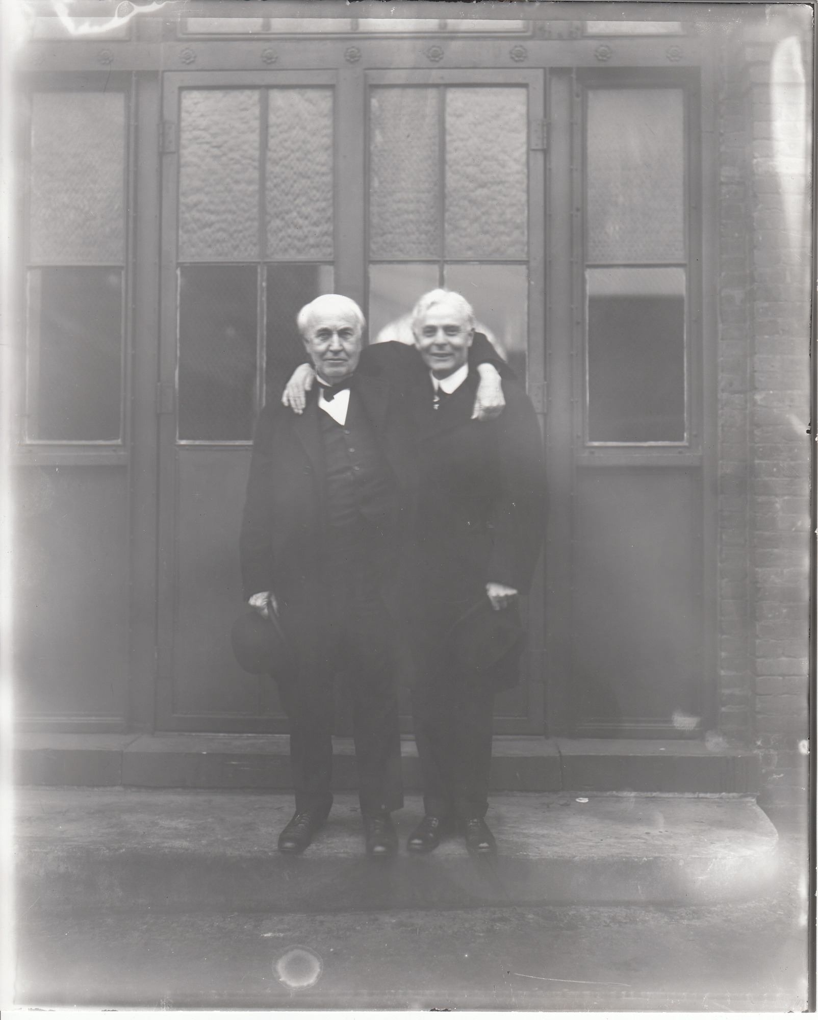 Thomas Edison and Ollie Hanson in front of Building 5 at Edison's West Orange Laboratory.