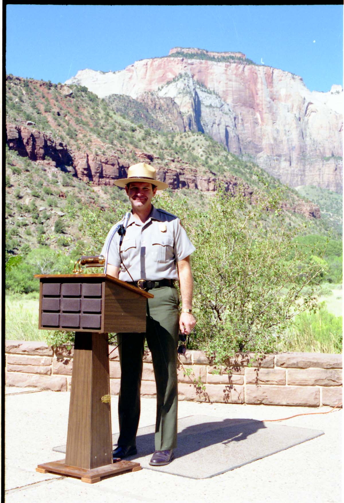 Color Photos of the parks 72nd anniversary celebrations- cake cutting, barbecue, speakers.