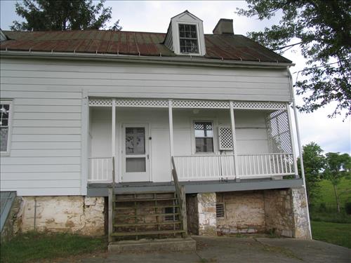 Exterior of the william Roulette Farmhouse in June 2010
