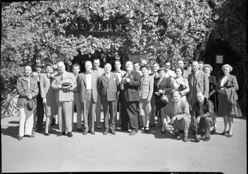 House Public Lands Committee in front of the Museum. Left to Right:
1. Fred L. Crawford (Michigan); 2. “Stranger who horned in”; 3. Max Stern – Reclamation Info.; 4. Miss Gardiner, Sec’y to Crawford; 5. Frank A. Kittredge, Supt. Yosemite; 6. Norris Poulson (Arizona); 7. Clair Engle (California); 8. N/A; 9. N/A; 10. Charles H. Russell (Nevada); 11. Frank A. Barrett (Wyoming); 12. N/A; 13. Phil Dickinson, Assist. Reg. Dir. Reclamation; 14. Mrs. Fernandez; 15. John Sanborn; 16. N/A; 17. Jay LeFevre (New York); 18. Mrs. Jenison; 19. Antonio M. Fernandez (New Mexico); 20. N/A; 21. Hilmer Oehlmann, Y.P. & C. Co.; 22. N/A; 23. N/A; 24. N/A

Crouched in foreground: Connie Wirth and Edward Jennison