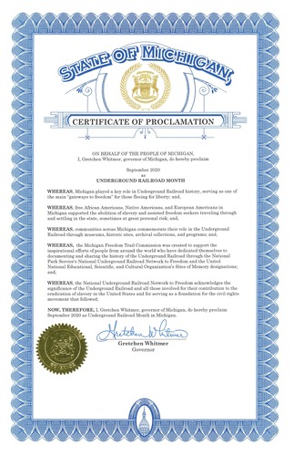 The document is surrounded by an ornate, royal blue border. The header of the document, reading "State of Michigan Certificate of Proclamation"  is written in an ornate font, and is written within an ornate design. The design consists of a circle embedded within an arch, and whose bottom is cut off by a parallelogram that stretches the width of the page with ornate decorations on either side. At the bottom of the page is the governor's signature, as well as a gold seal.
