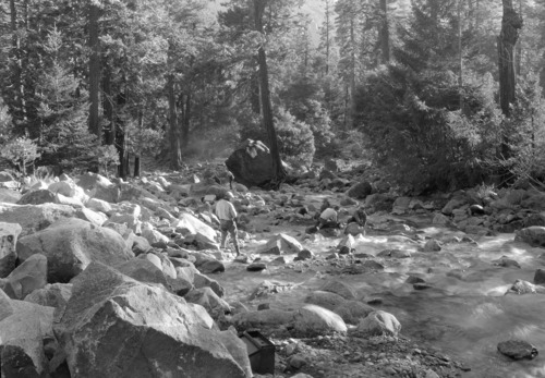 CWA men clearing channel of Yosemite Creek; Showing stream bed with rocks partially removed.