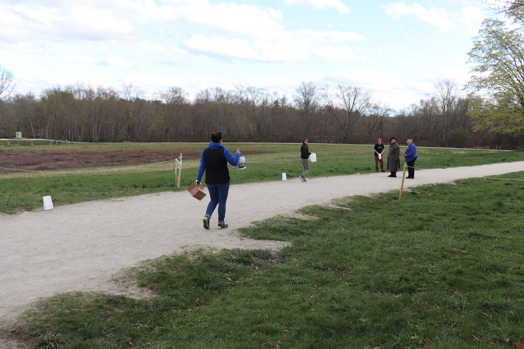 Vigil set up, laying out lanterns along the road to the North Bridge. 