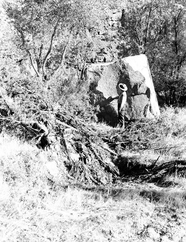 Rock fall behind Chief Ranger Fred Brueck's residence. Image shows ranger.