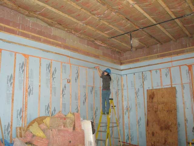 After insulation is installed, the finish work involves foam pumped into any remaining cracks.
