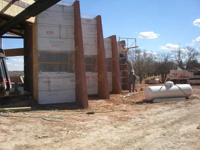 A wire mesh is put into place to hold the stucco as it is applied to the wall.
