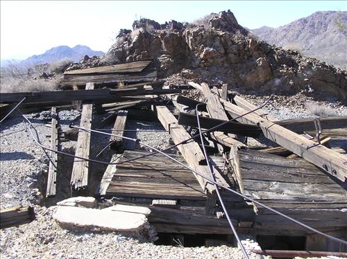 Open shafts and adits at Bighorn Mine, an abandoned gold mine in Feb 2007 and Jan 2009.