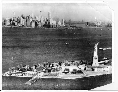 New York harbor, Bedloe's Island and the Statue of Liberty, and Ellis Island, ca. 1930