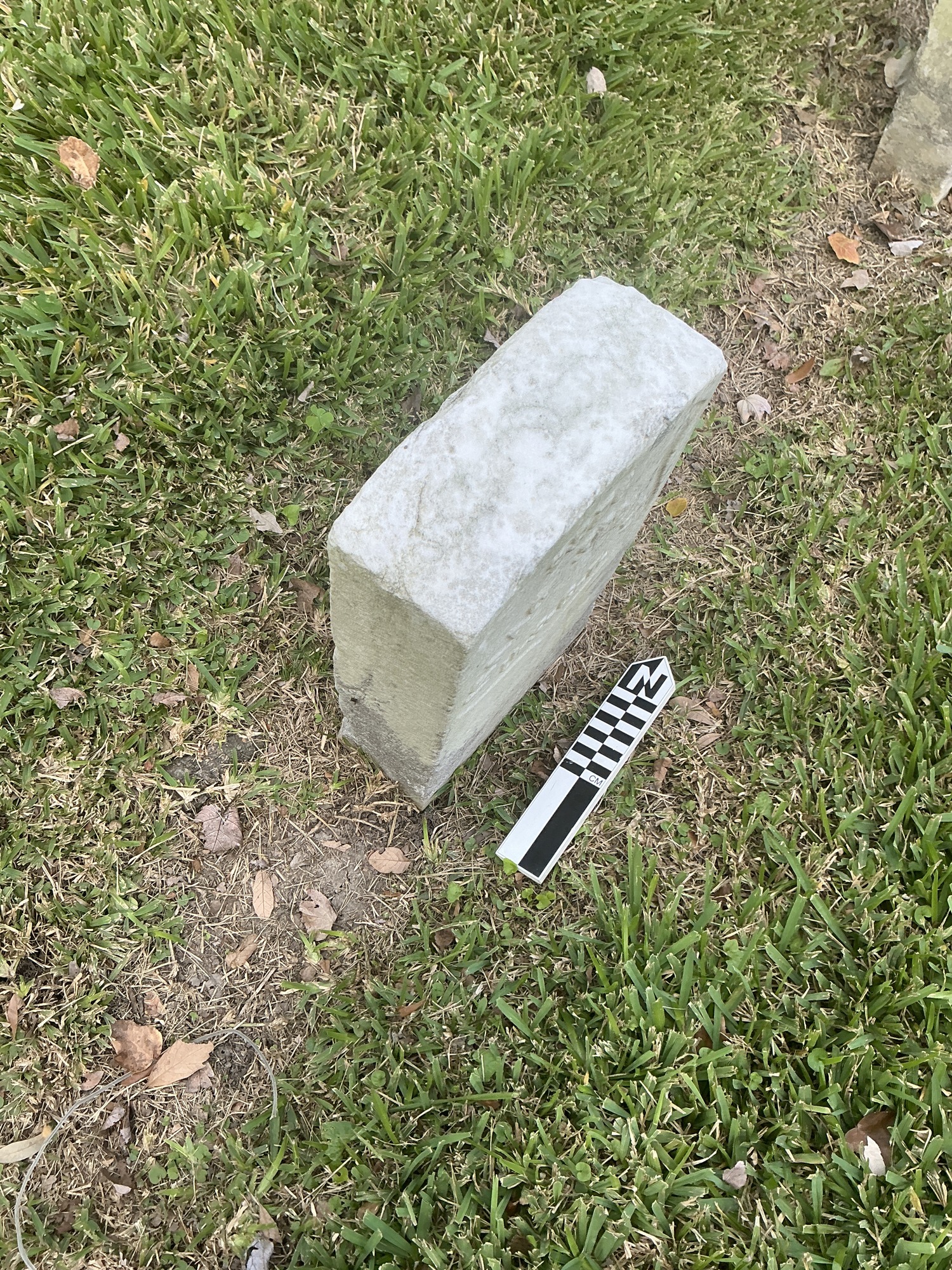 Extra image of historic upright marble headstone with recessed shield face.