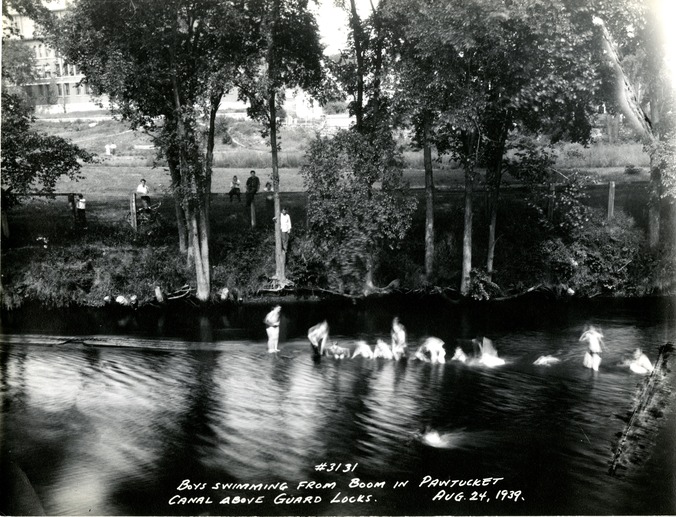 A photo showing boys in the Pawtucket Canal.