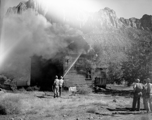 Fire prevention training; demonstration for students of Springdale school. Burning of old Justet home adjacent to Springdale school.