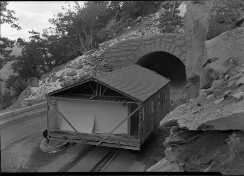 Building used at the Ahwahnee during the Navy occupation being transported to Crane Flat by way of Big Oak Flat Road and tunnel. See RL-19,834-19,838.