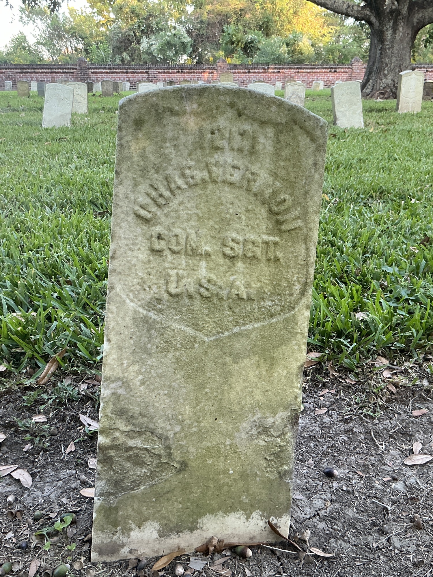 Front of historic upright marble headstone