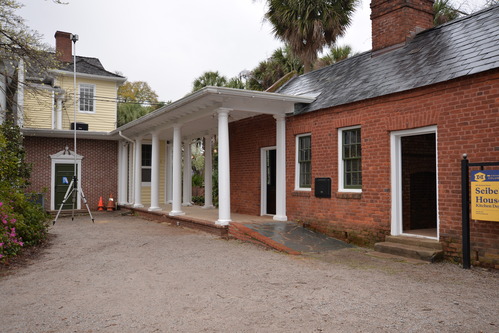 Brick structure with centralized chimney.