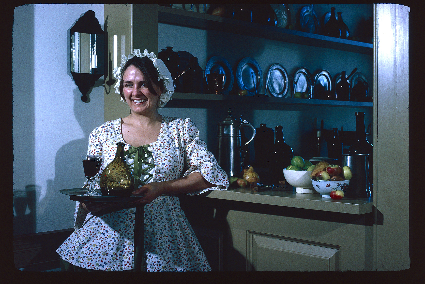 City Tavern. Interior. Bar Room, 1st floor. Looking west. Woman with tray serving in period costume.