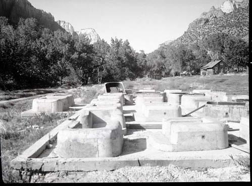 Cinder concrete, monolithic cast fireplaces in South Campground.