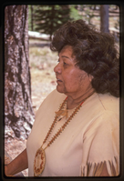 A woman in a Native American attire. 