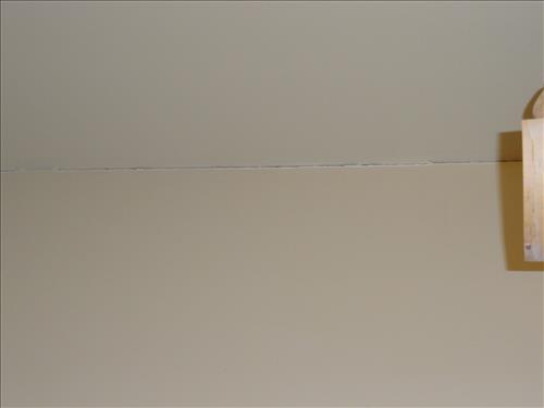 Cracks in the interior walls of Heritage Center