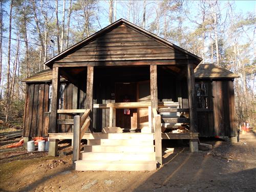 Rehabilitate historic cabin building 65 in camp Mawavi (Camp 2) at Prince William Forest Park in June 2011