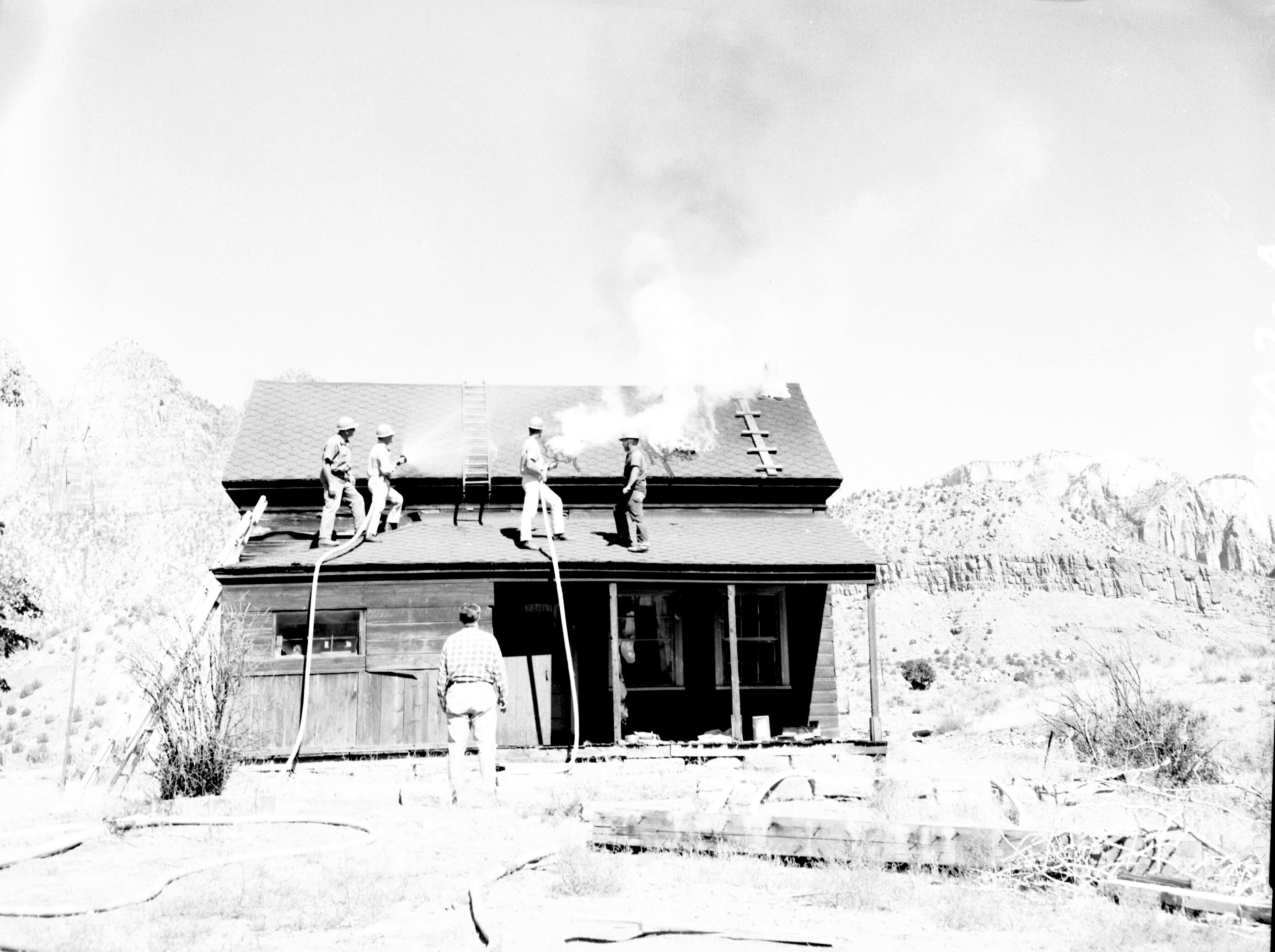 Fire prevention training; demonstration for students of Springdale school. Burning of old Justet home adjacent to Springdale school.